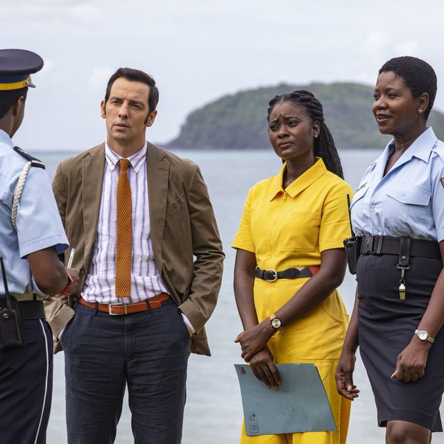 death in paradise,l r marlon pryce tahj miles, di neville parker ralf little, naomi thomas shantol jackson and darlene curtis ginny